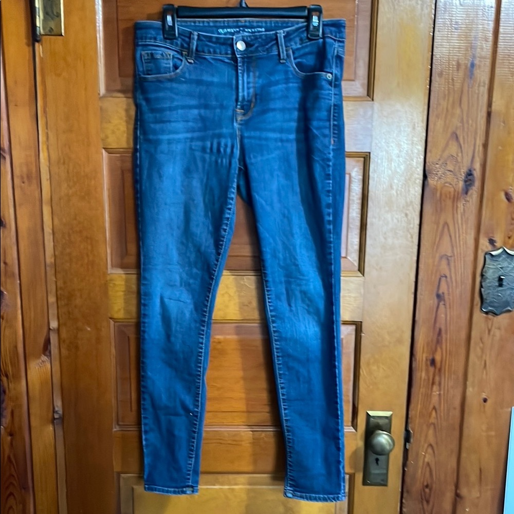 Blue Skinny Jeans with Gold Stitching and Belt Loops